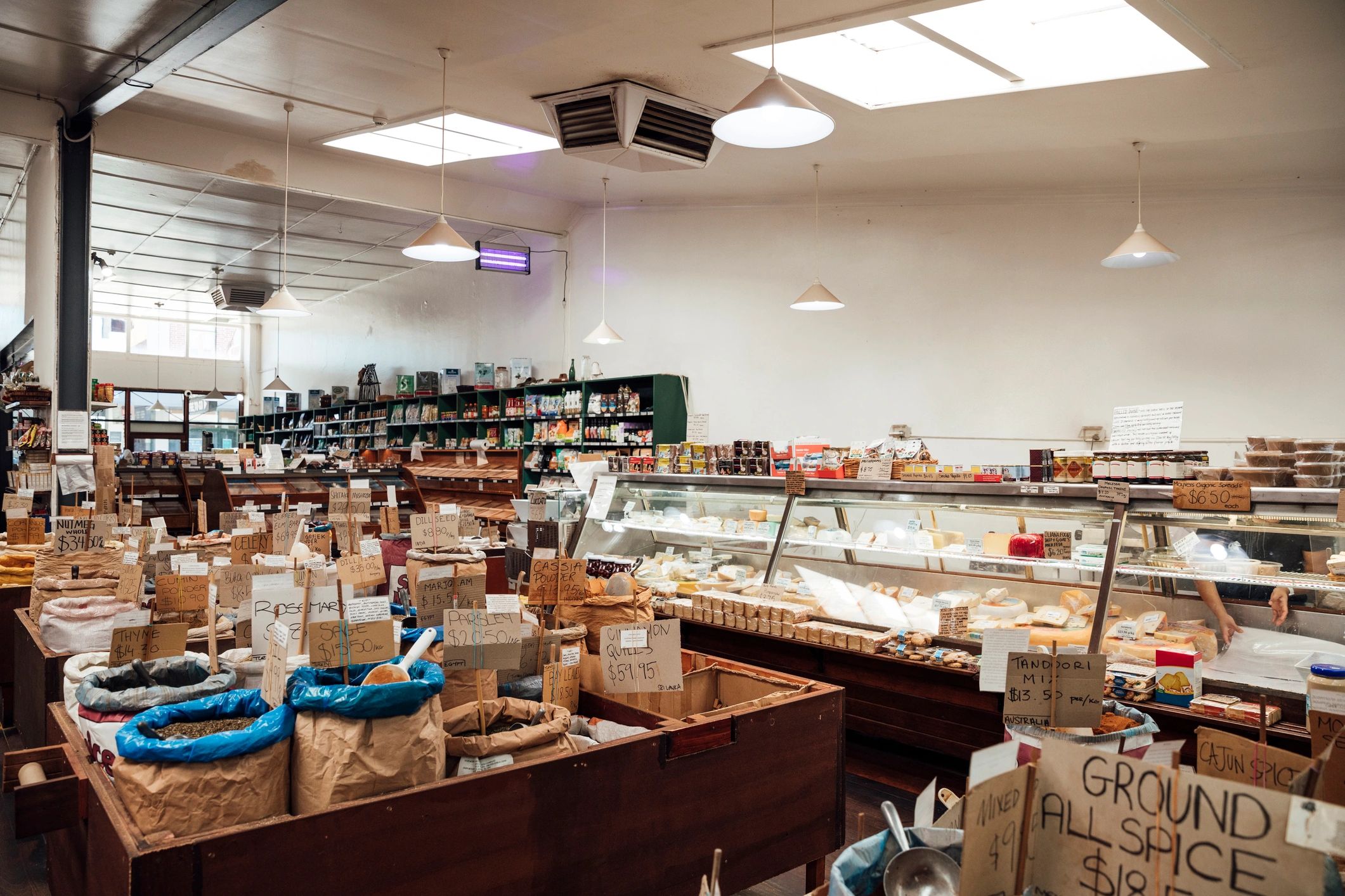 Supermarket interior with fresh produce displays
