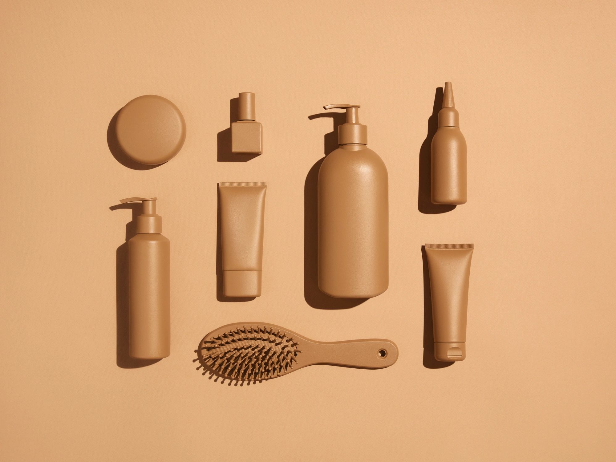 Beauty and personal care products arranged in a clean flat lay