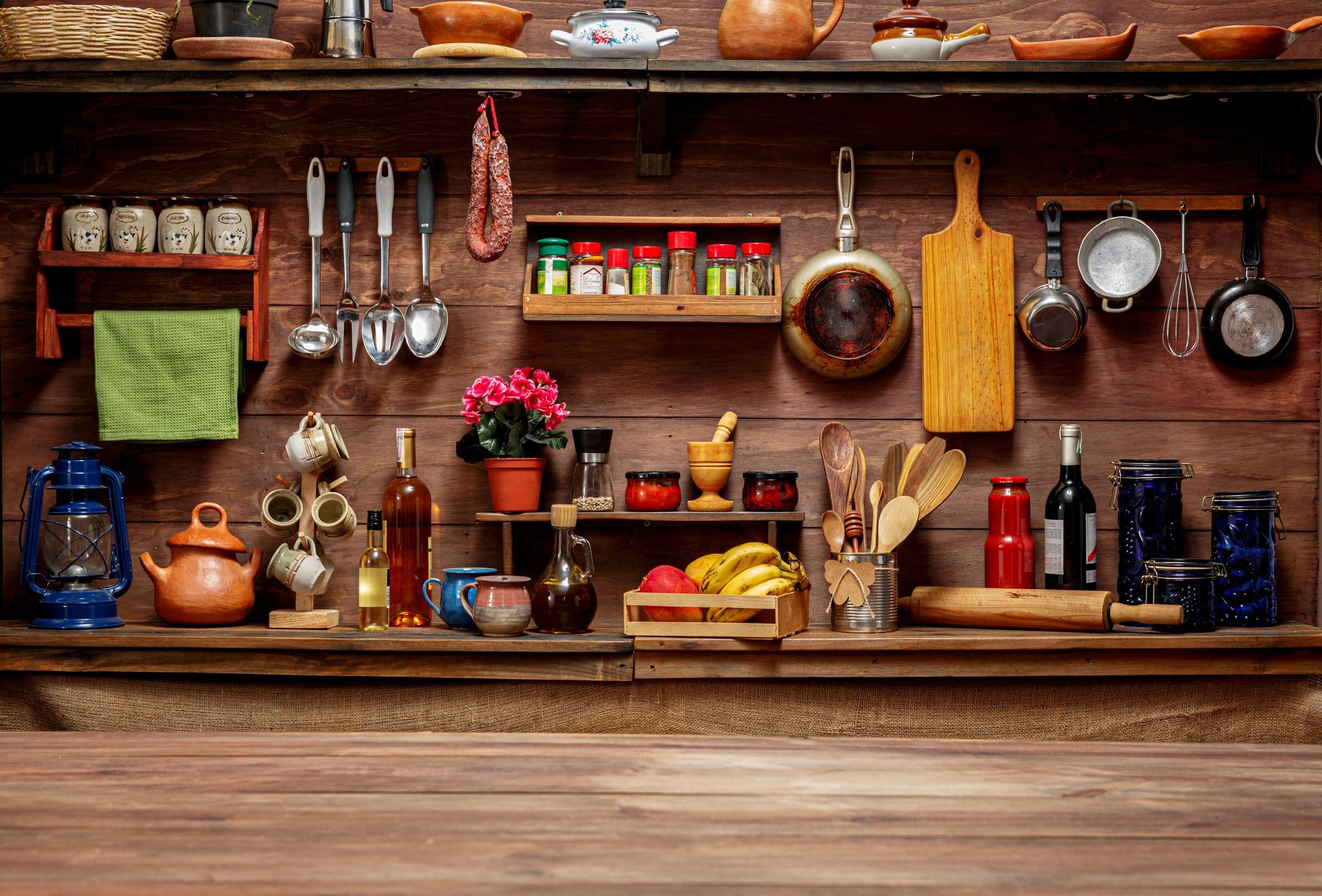 Rustic kitchen with cookware and utensils